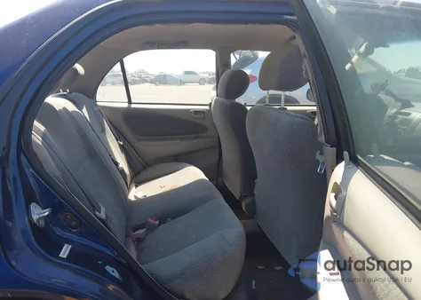 2002 Toyota Corolla Le из США, поврежденный, VIN 2T1BR12E52C558044